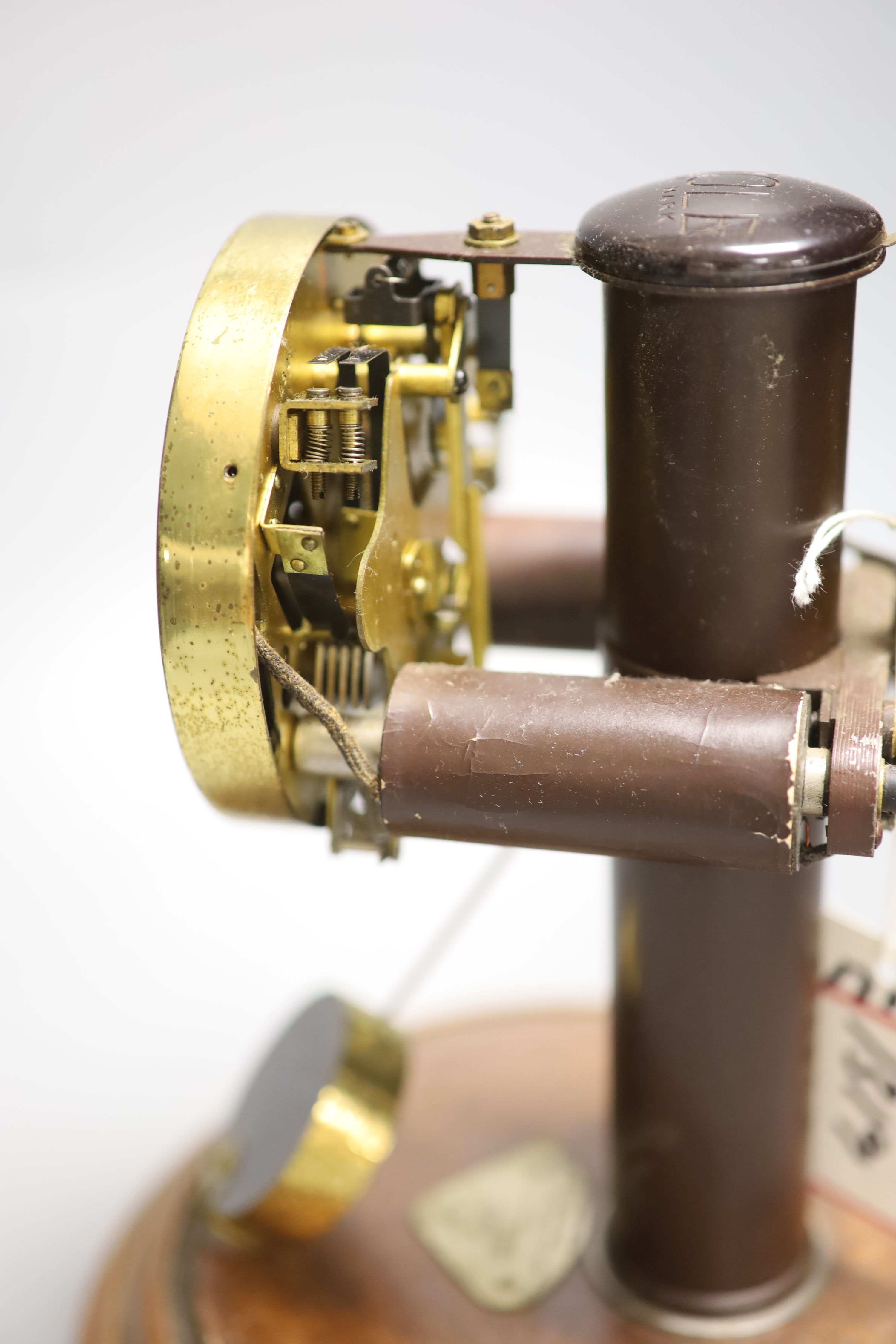 A Bulle electric mantel clock, under glass dome, overall height 28cm